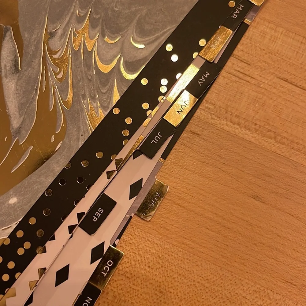 Second hand planner with calendar pages and tabs